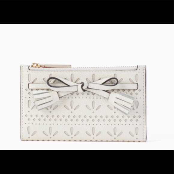 kate spade Handbags - KATE SPADE WHITE LEATHER WALLET